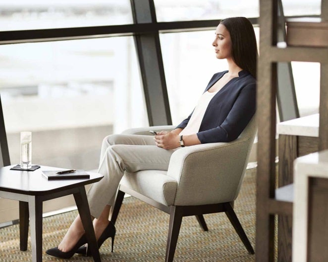 Woman in airport lounge